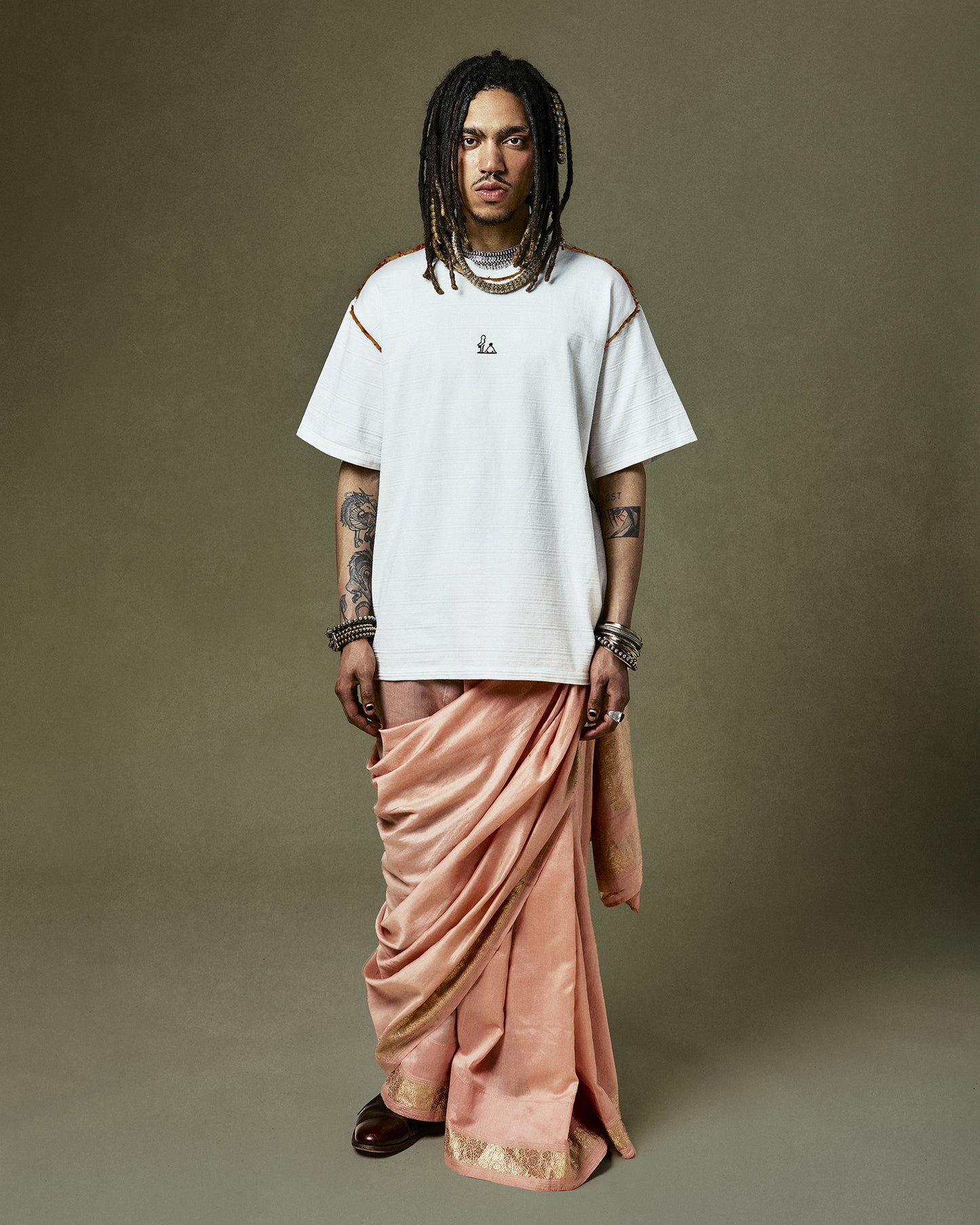 Quinto T-Shirt symbolizing the fusion of heritage and style, featuring a 'Calabria-Sicilia' narrative, saree seam detailing, and a classic ribbed crew neck.